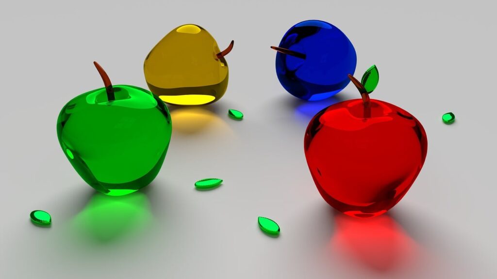a group of glass apples