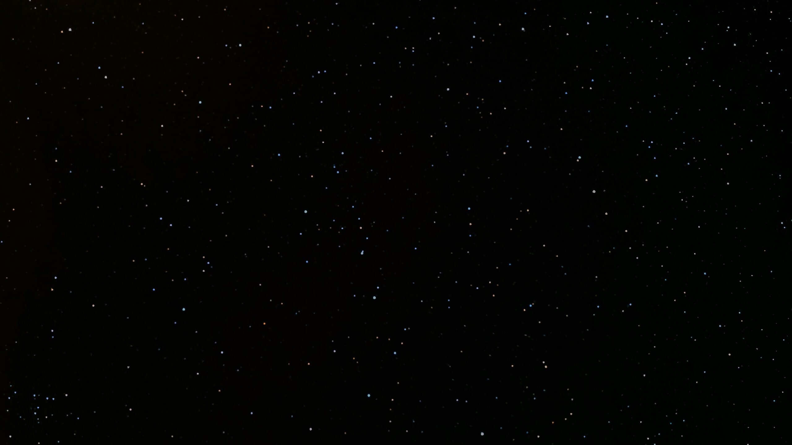 a black sky with many small dots